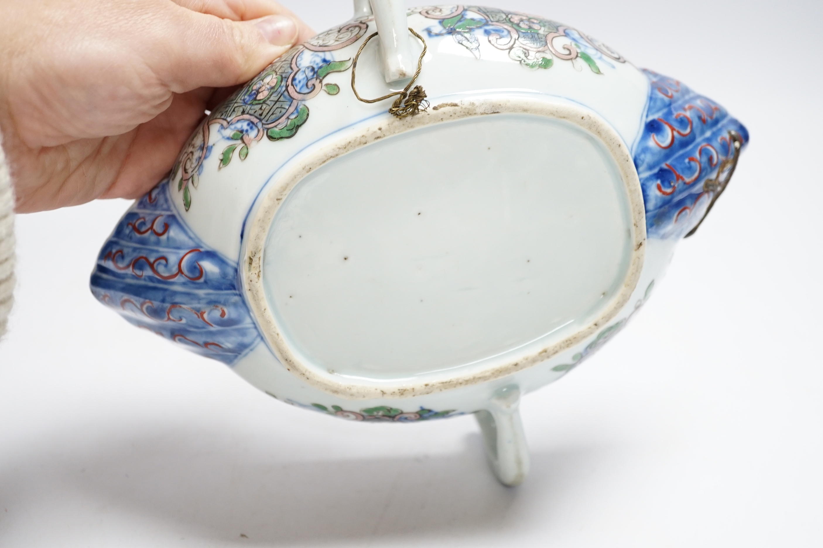 A Chinese clobbered blue and white double lipped sauceboat, Qianlong period, 23cm high